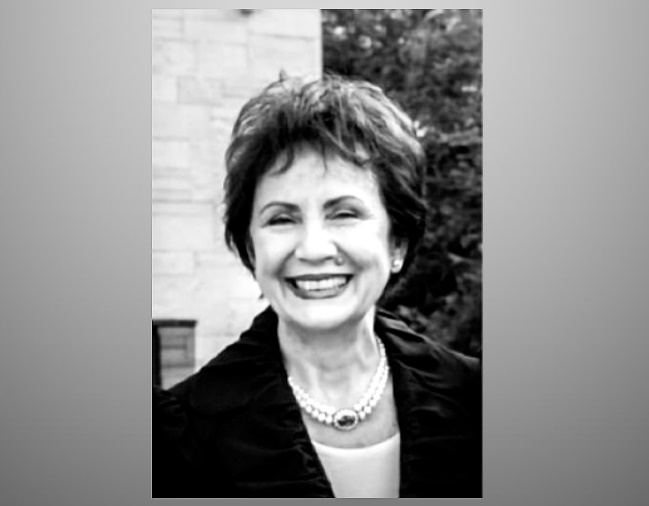 A person smiling for a picture
Description automatically generated